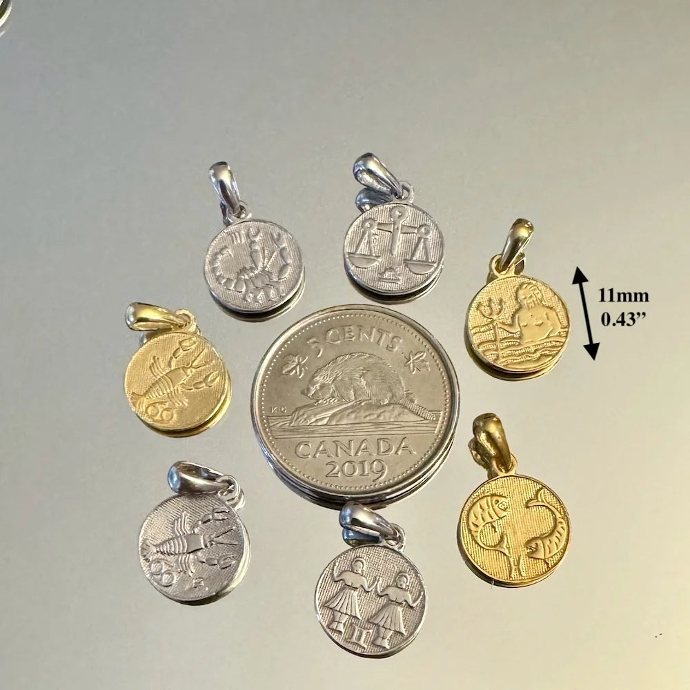 Vintage gold and silver pendants featuring intricate designs, perfect for men or women seeking unique jewelry.