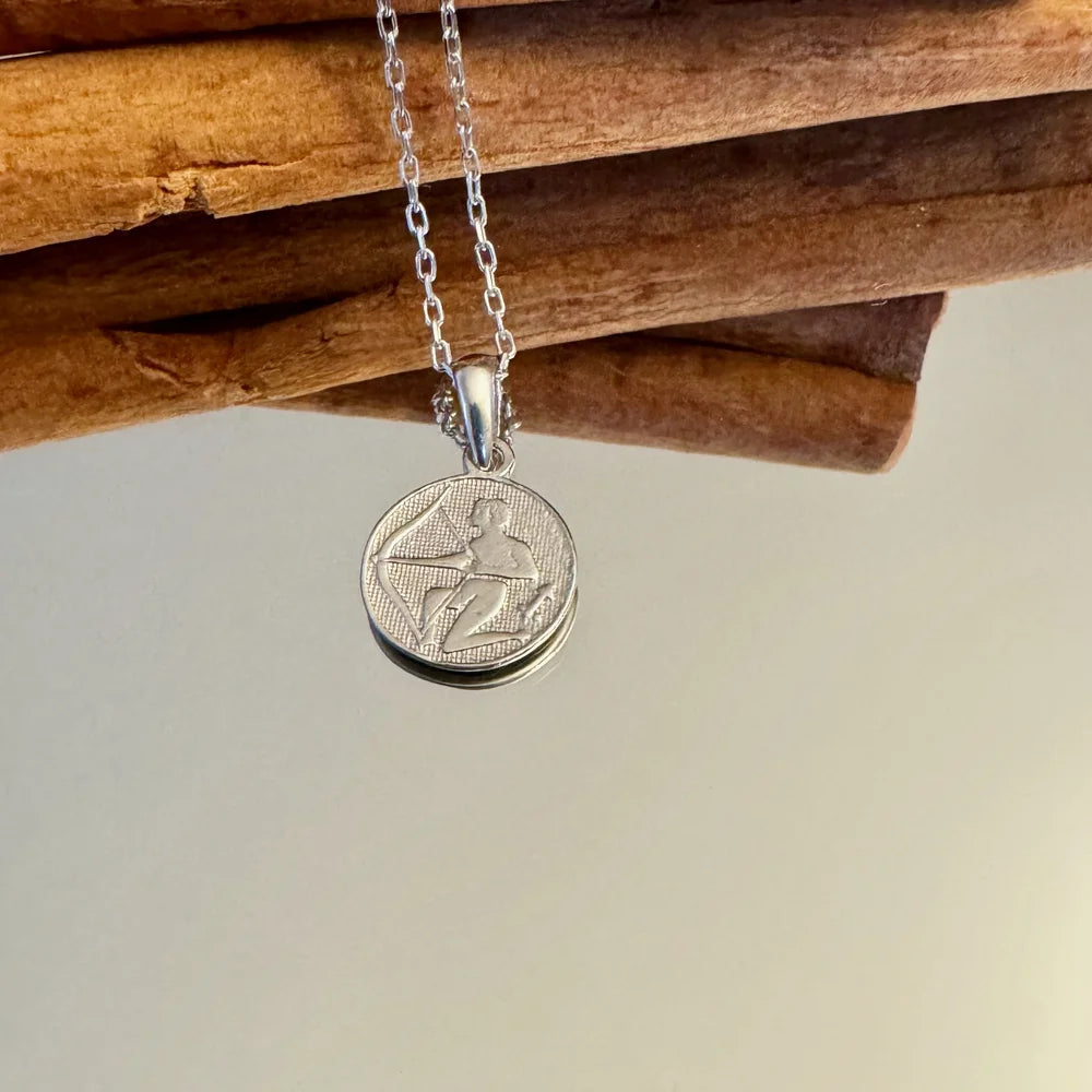 Silver zodiac sign pendant necklace for women, featuring a Sagittarius design, perfect for everyday wear or special occasions.