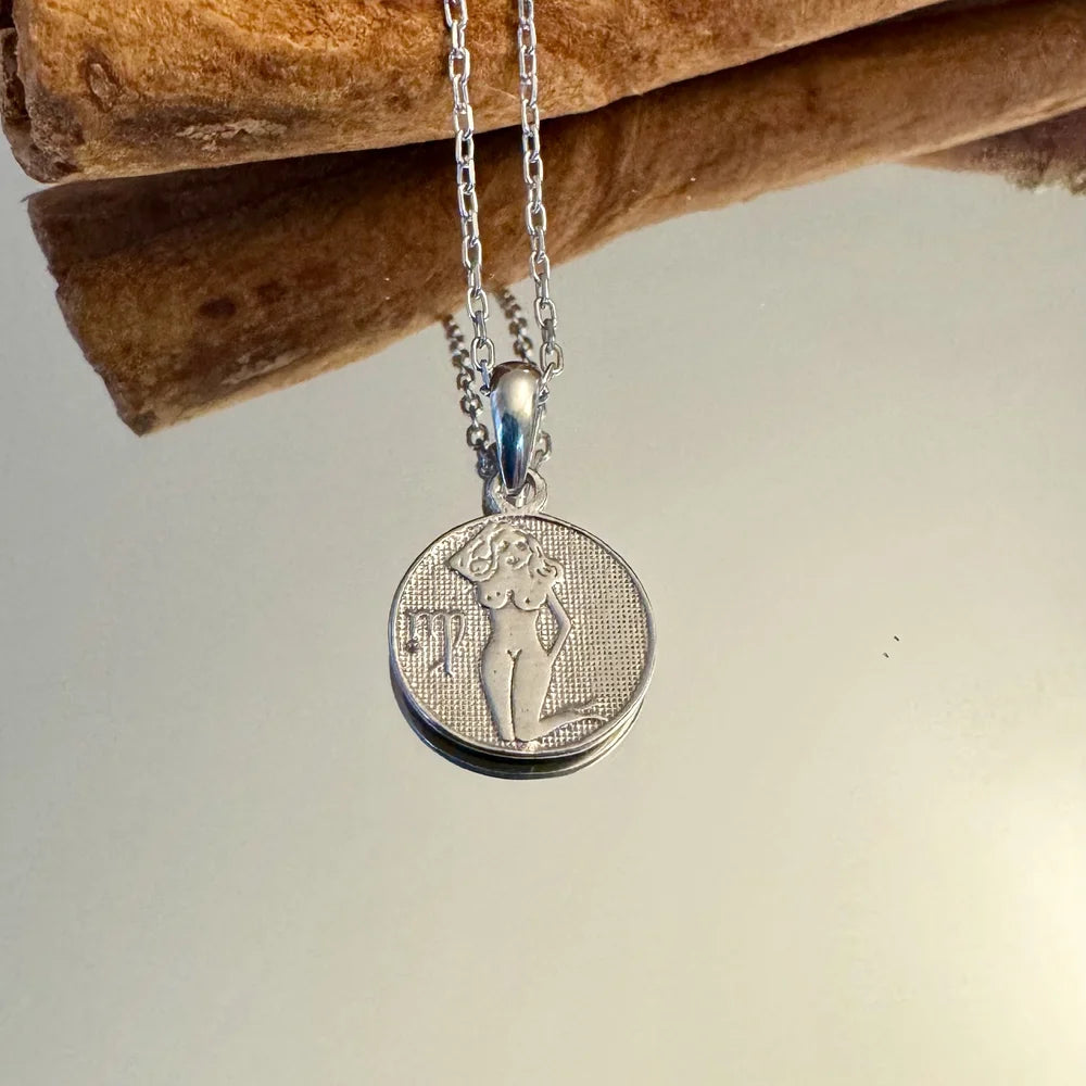Vintage silver pendant necklace featuring a unique design, perfect for women seeking a stylish, bold accessory.