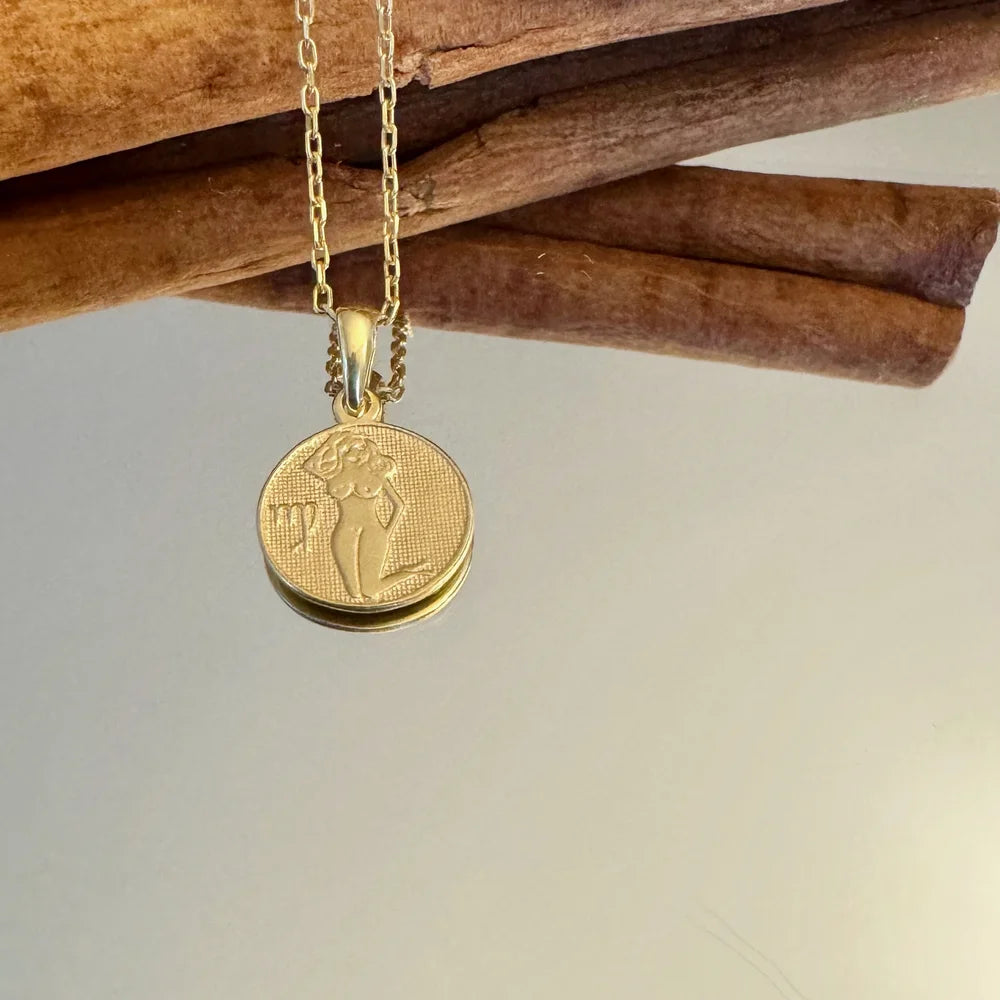 Gold zodiac pendant necklace featuring a vintage Virgo design, perfect for women seeking a chic, astrological accessory.