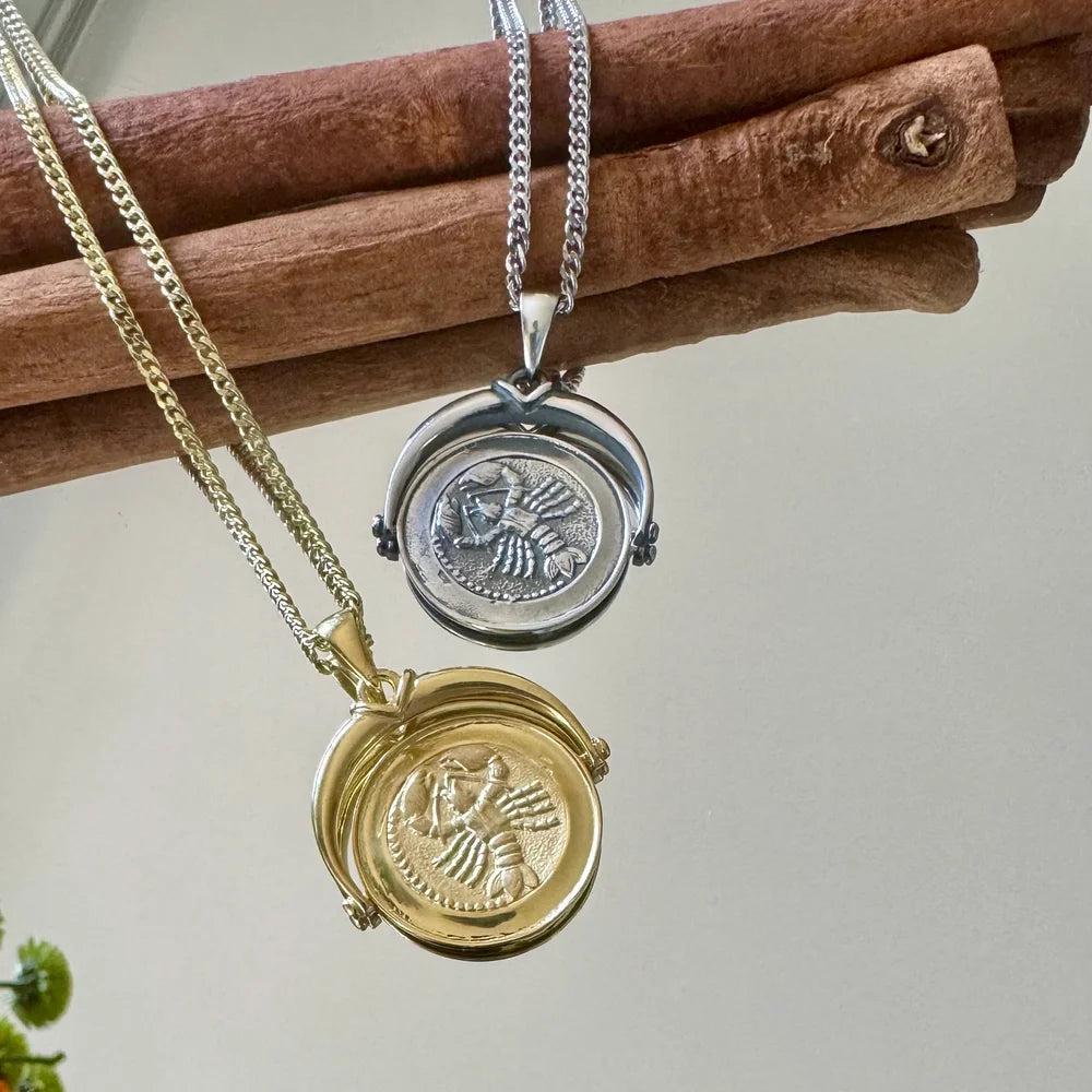 Stylish gold and silver lockets featuring intricate designs, perfect for women seeking a vintage touch in their jewelry collection.
