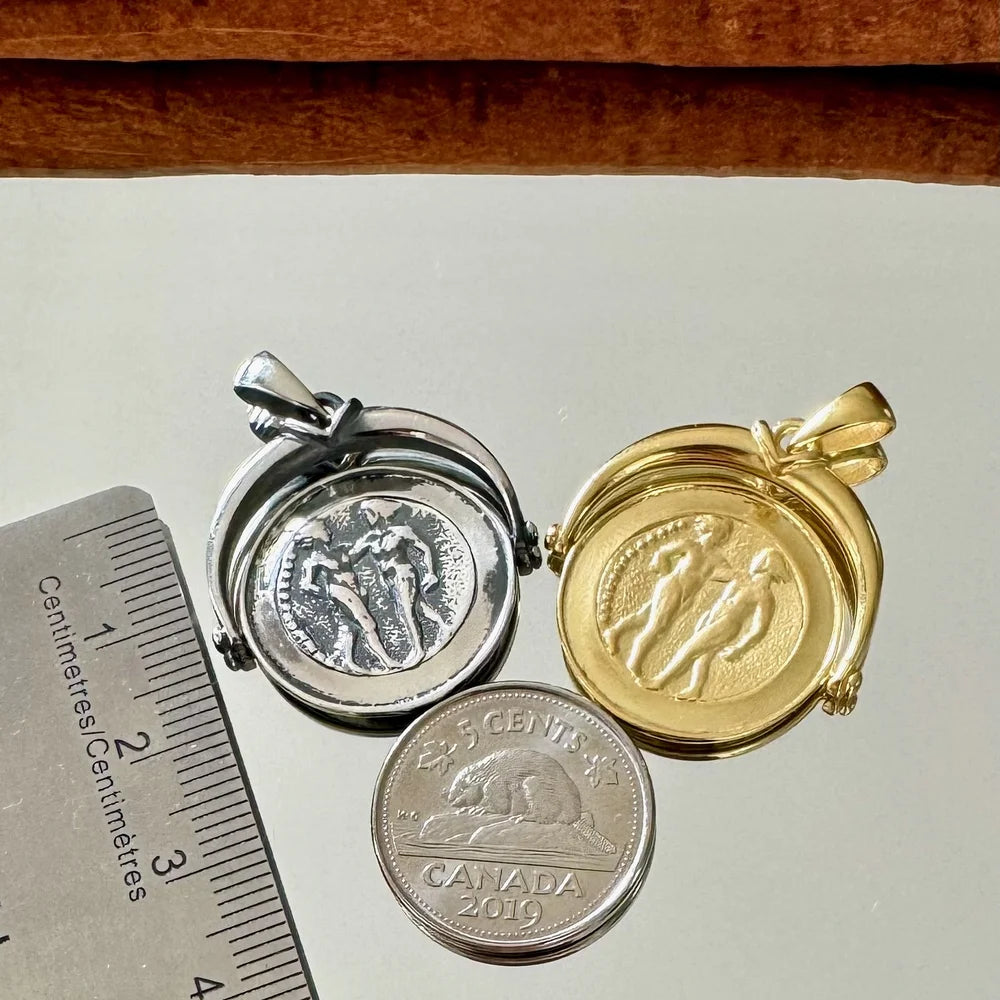 Silver and gold vintage lockets featuring intricate designs, perfect for unisex style and special occasions.