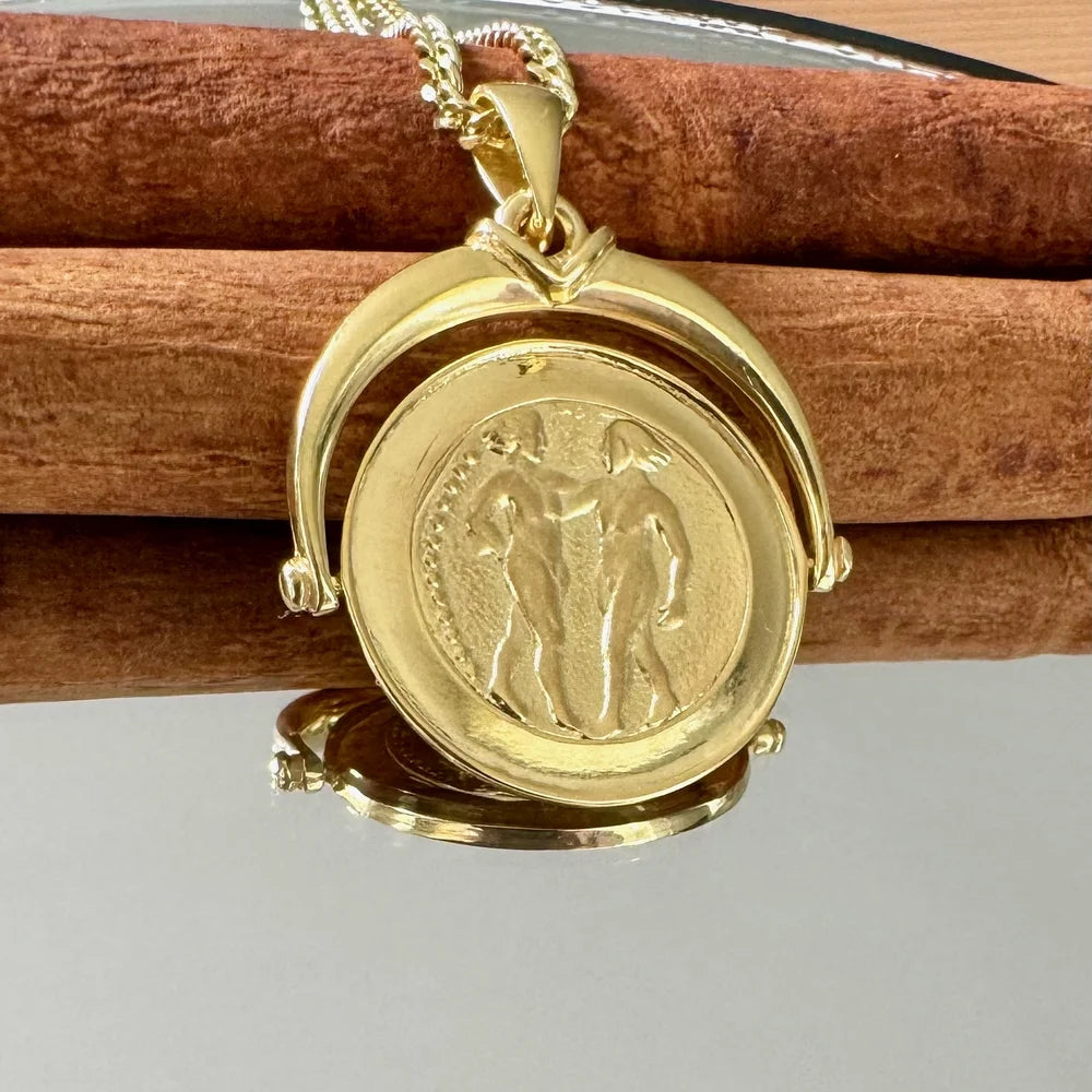 Elegant gold locket necklace featuring a vintage design, perfect for women who appreciate classic jewelry styles.