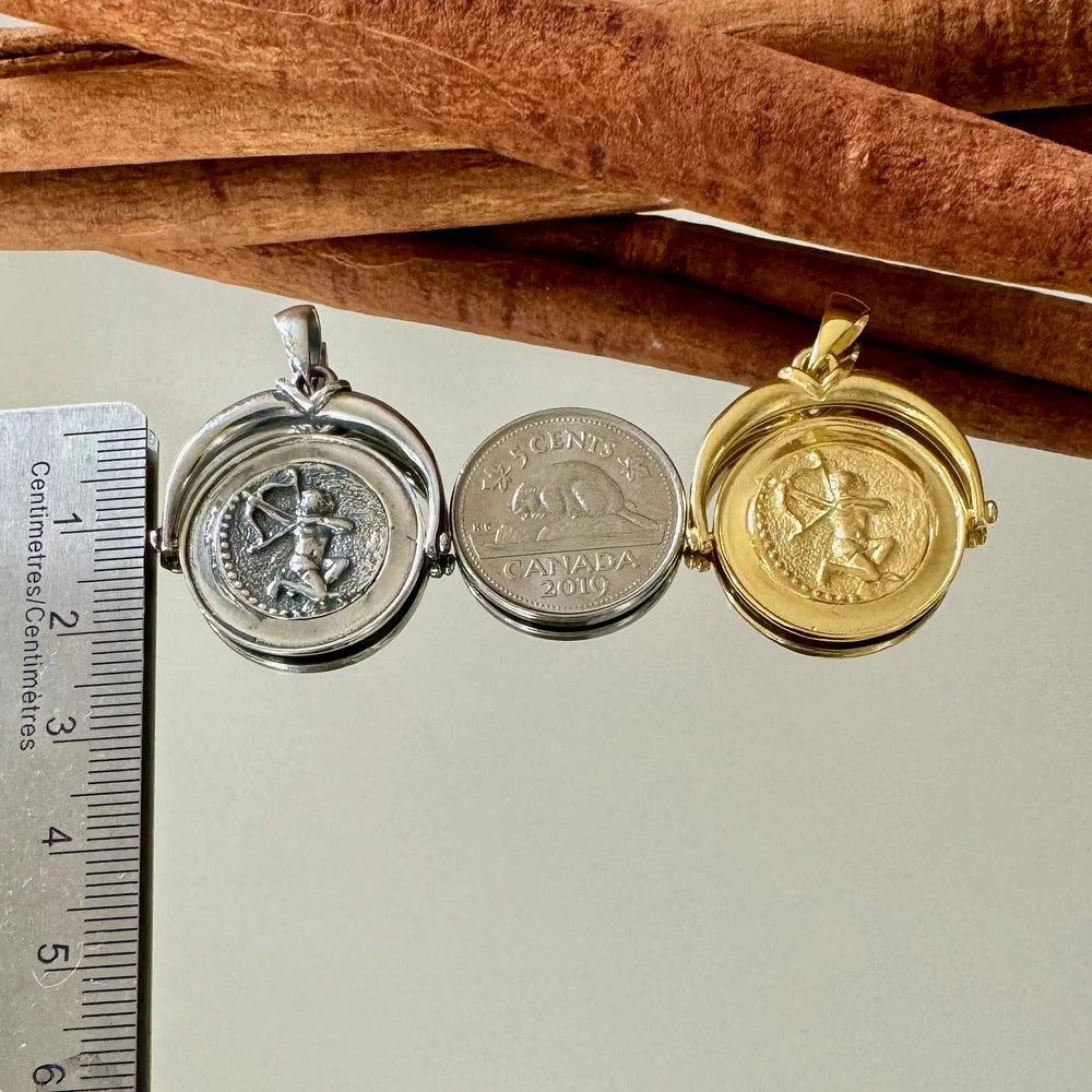 Sterling silver and gold-tone coin locket pendant, perfect for women seeking unique vintage charm for any occasion.