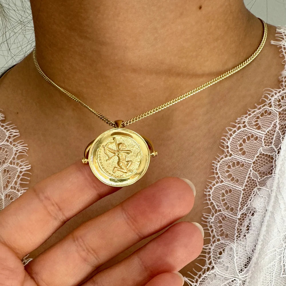 Elegant gold pendant necklace featuring a vintage coin design, perfect for women seeking a classic accessory.