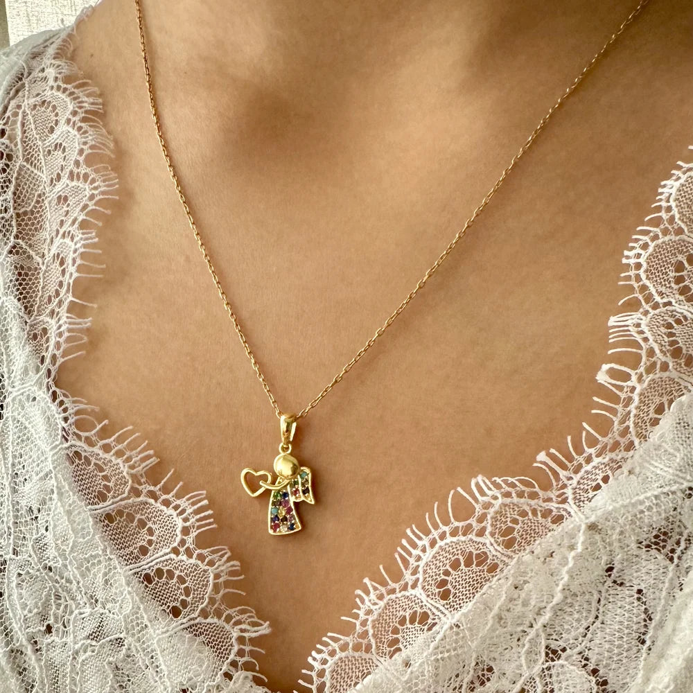 Delicate gold angel pendant necklace adorned with colorful gemstones, perfect for women seeking a charming touch.