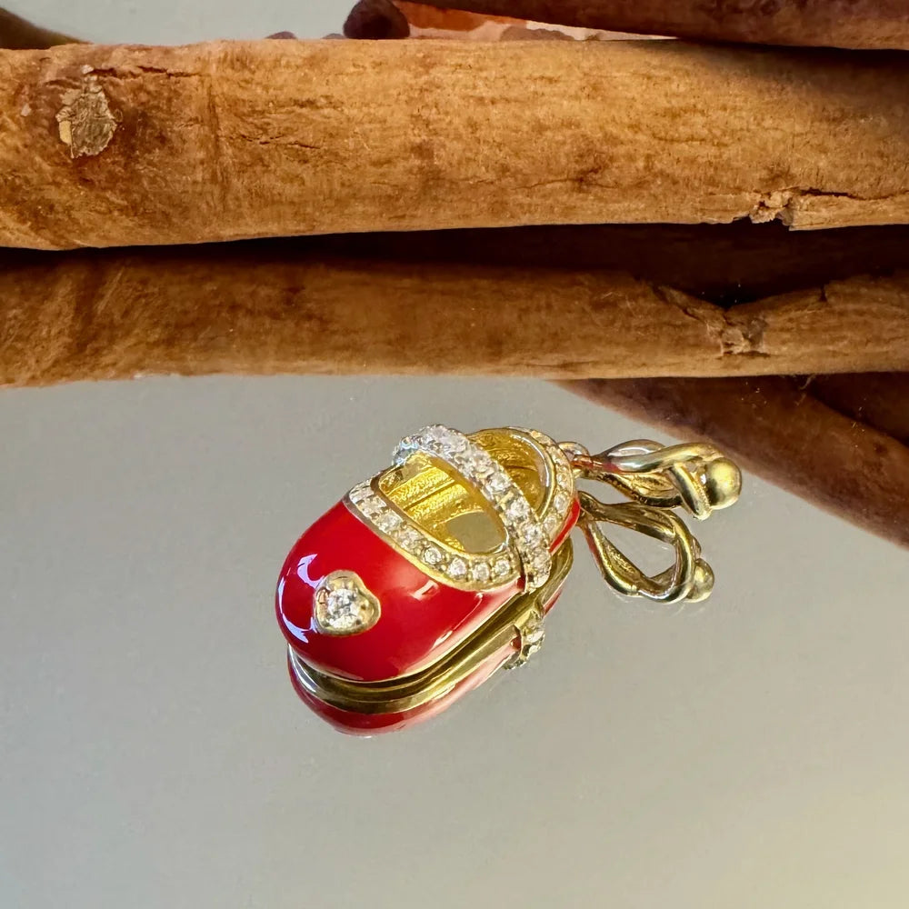 Red vintage car charm pendant with gold plating and sparkling gemstones, perfect for women who love unique jewelry.