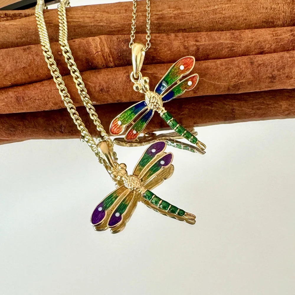 Vibrant gold dragonfly necklaces adorned with colorful enamel, perfect for women who love unique, bohemian accessories.