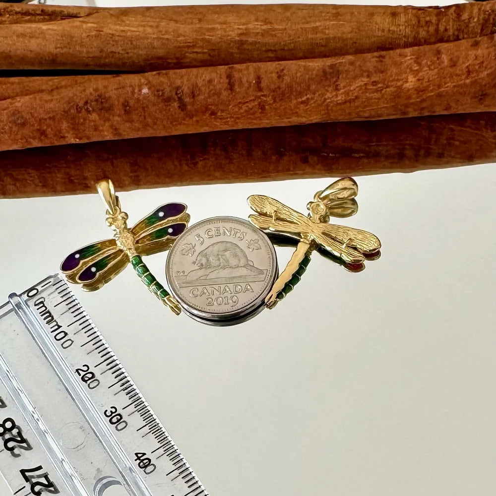 Gold dragonfly pendant adorned with colorful gemstones, perfect for women seeking a whimsical, vintage-inspired jewelry piece.