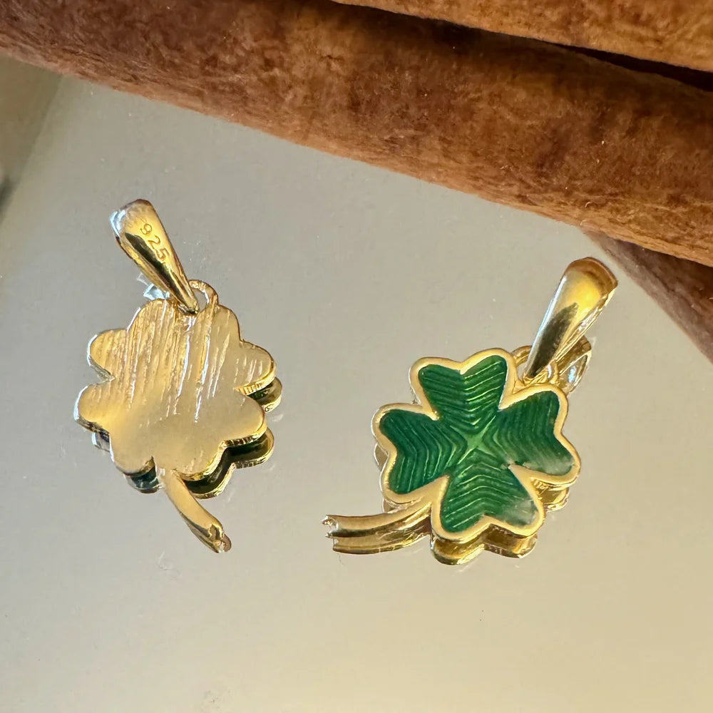 Gold clover pendant with green enamel, perfect for women's bohemian jewelry collections or gifts for lucky occasions.