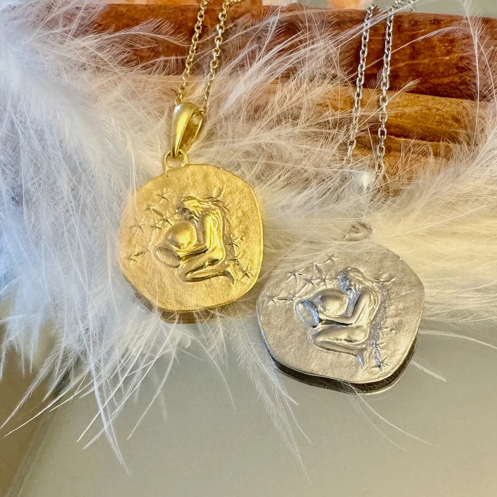 Gold and silver pendant necklaces with unique woman figure design, perfect for unisex minimalist style lovers.