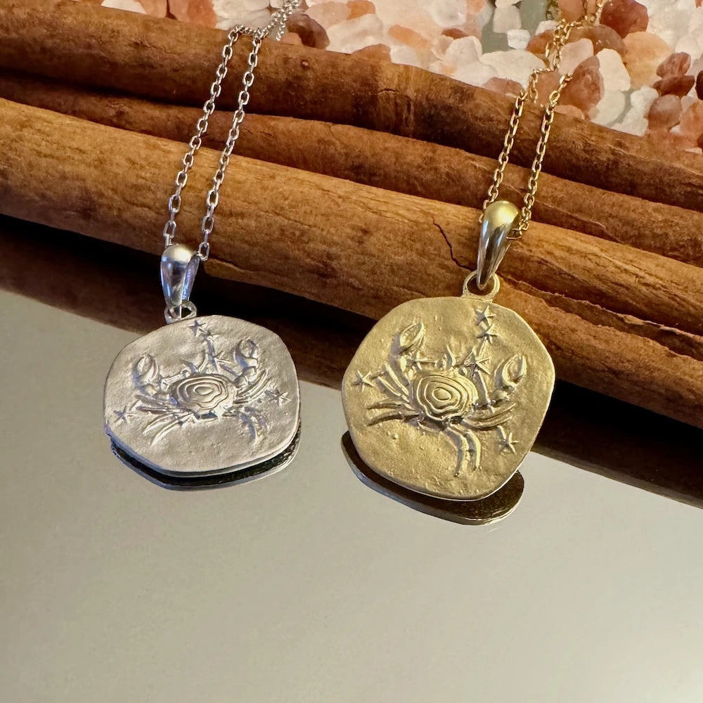 Handcrafted silver and gold crab pendant necklaces for women, perfect for beach lovers and unique gift occasions.