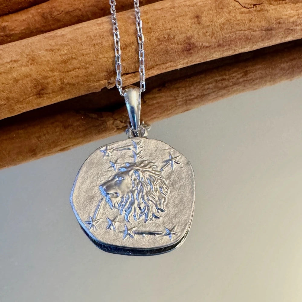 Sterling silver lion pendant necklace, perfect for men and women seeking a trendy, zodiac-inspired accessory.