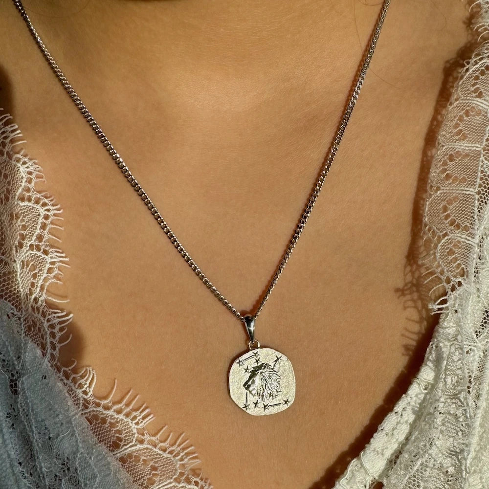 Sterling silver pendant necklace featuring a lion design, perfect for women seeking a classic, stylish accessory.