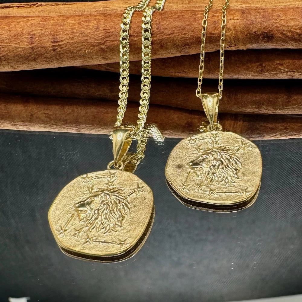 Gold lion pendant necklaces on a delicate chain, perfect for men and women seeking a bold, vintage-inspired accessory.