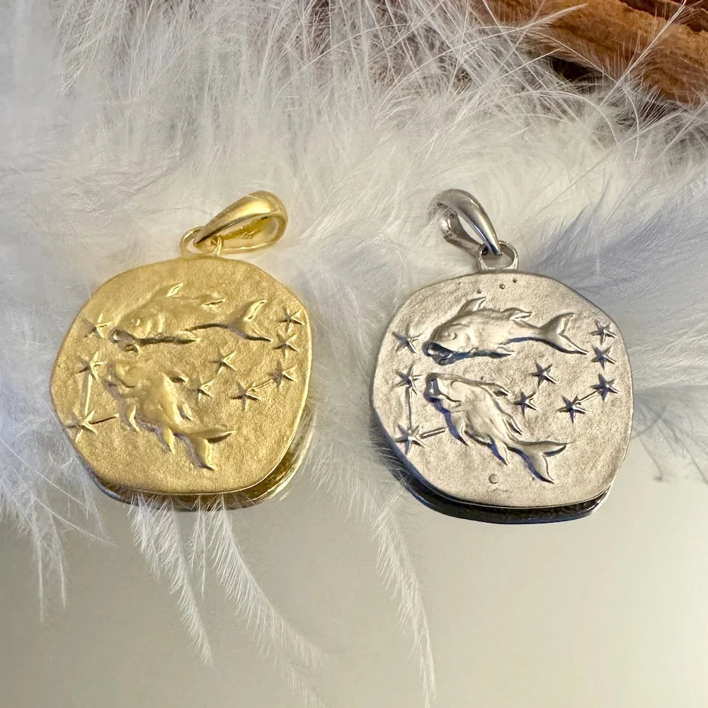 Gold and silver zodiac fish pendants, perfect for women; ideal for astrology lovers and bohemian styles.