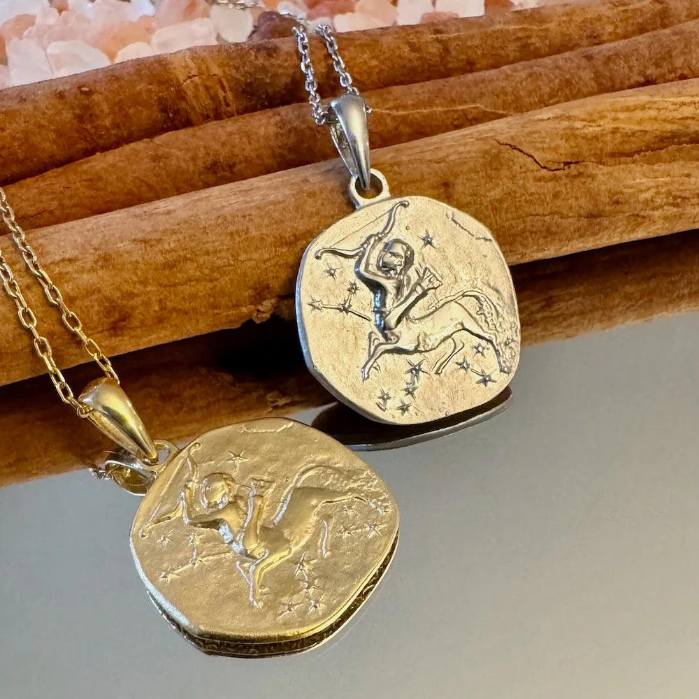 Vintage silver zodiac pendants for men, featuring intricate designs representing Sagittarius. Perfect for astrological lovers.