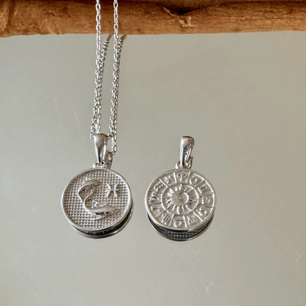 Silver zodiac charm pendant necklace, perfect for women seeking stylish, astrology-themed jewelry for any occasion.