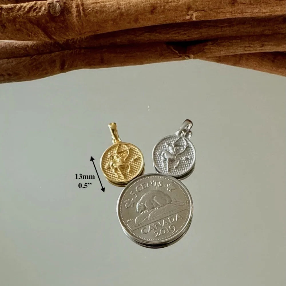Gold and silver animal-themed pendants, perfect for unisex minimalistic jewelry lovers. Ideal for casual or special occasions.
