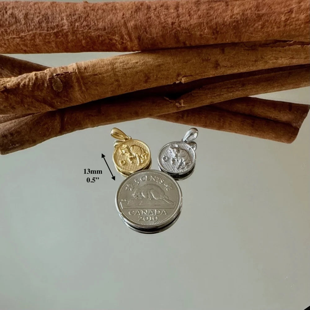 Gold and silver animal-themed pendants, perfect for women seeking minimalist, yet unique jewelry styles.