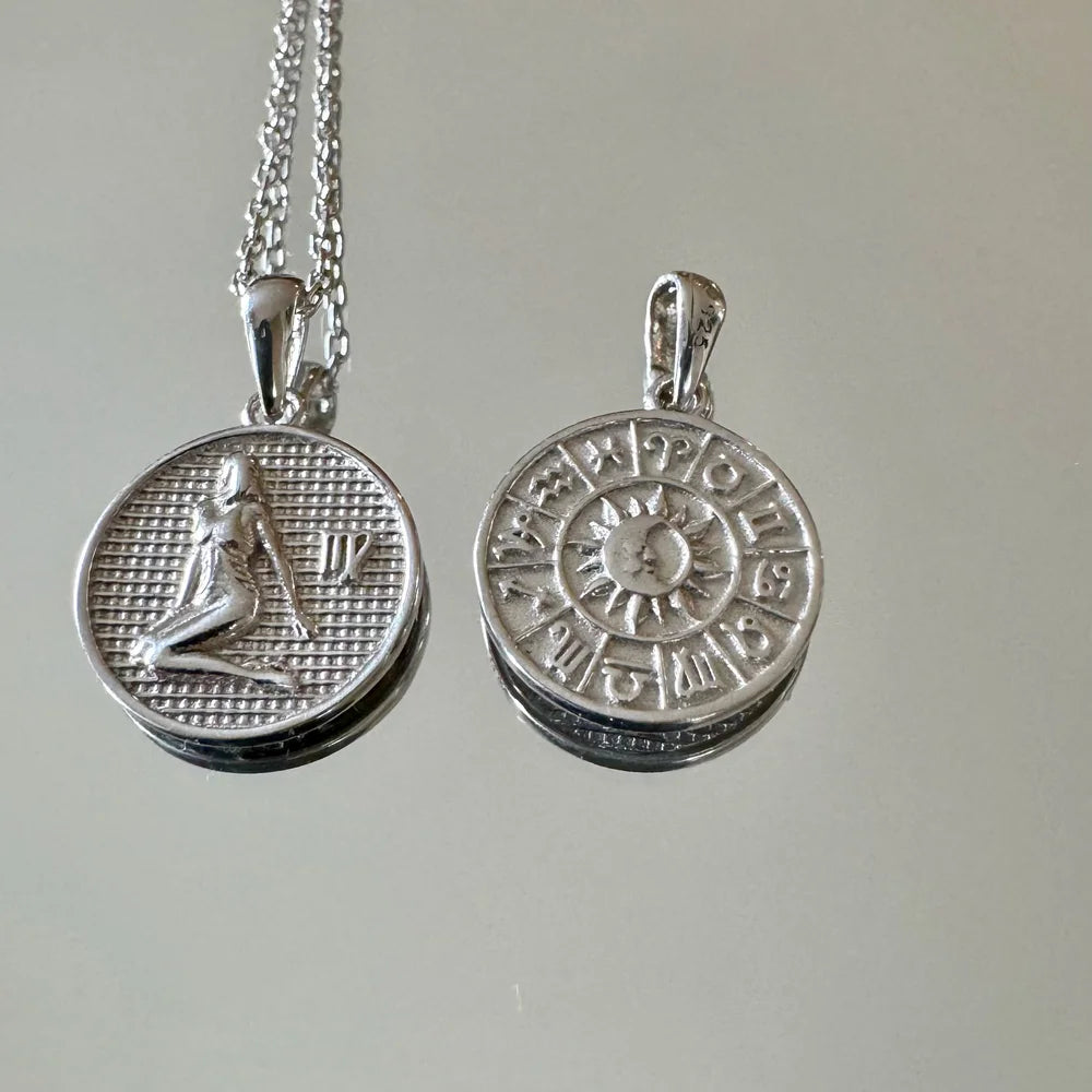 Sterling silver zodiac pendant necklace featuring intricate designs, perfect for women who love bohemian style jewelry.