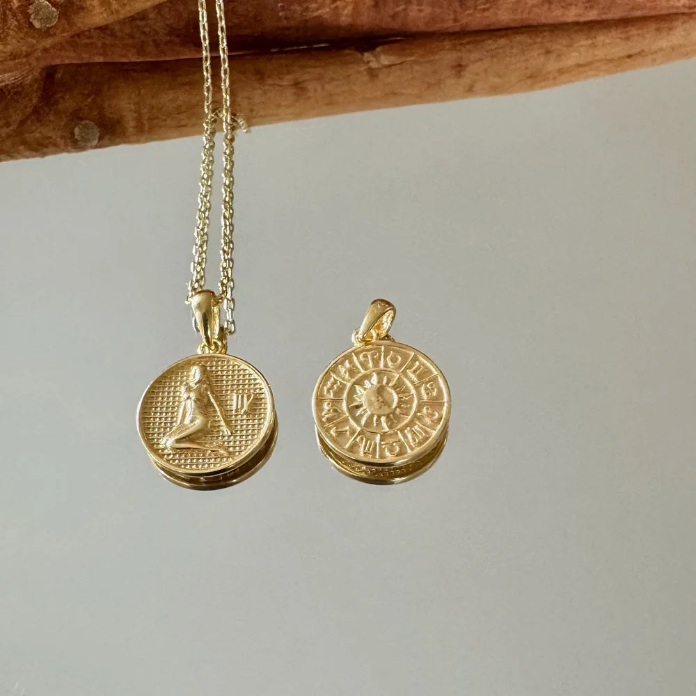 Elegant gold pendant necklace featuring intricate designs, perfect for women seeking a unique bohemian style.