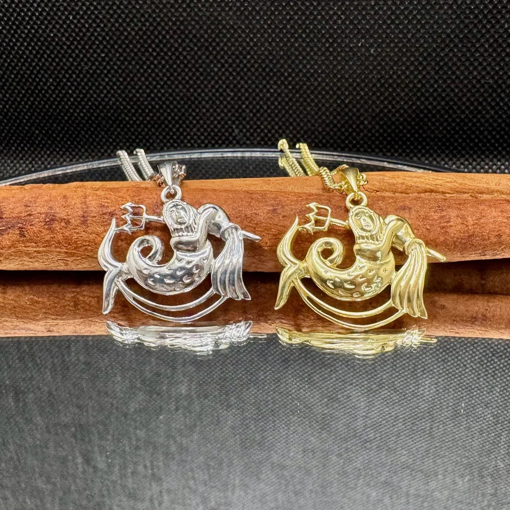 Silver and gold mermaid pendants, perfect for women, blend beachy charm with vintage elegance. Ideal for any occasion.