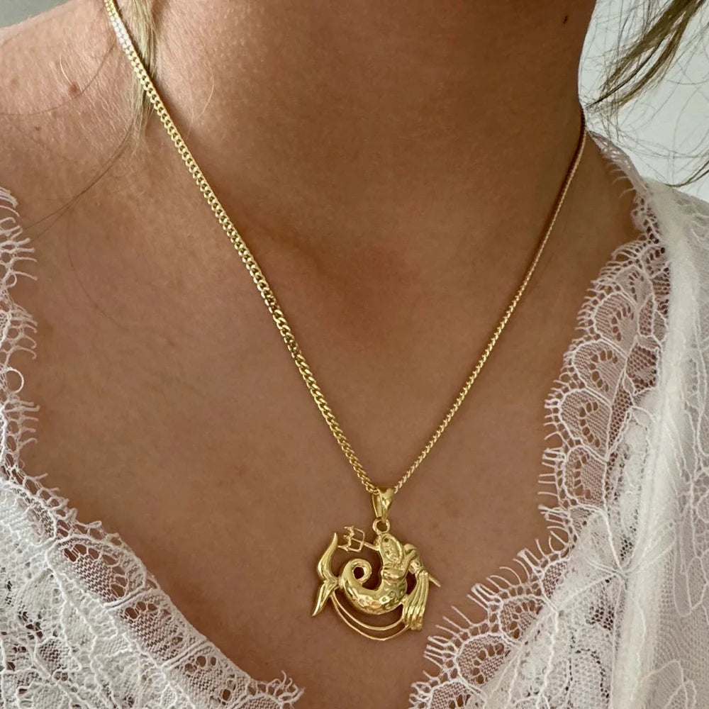 Gold zodiac sign necklace, perfect for women seeking a minimalist yet stylish accessory for any occasion.