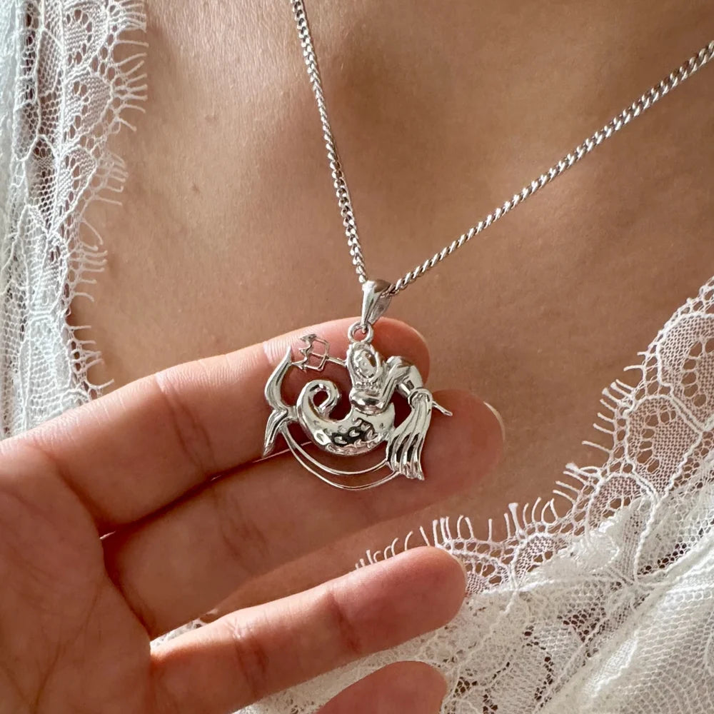 Detailed silver mermaid pendant necklace, perfect for women who love unique, ocean-inspired jewelry. Ideal for casual or beachwear.