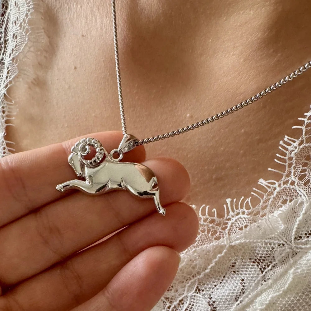 Sterling silver ram pendant necklace, perfect for women who appreciate minimalist and zodiac-inspired jewelry.
