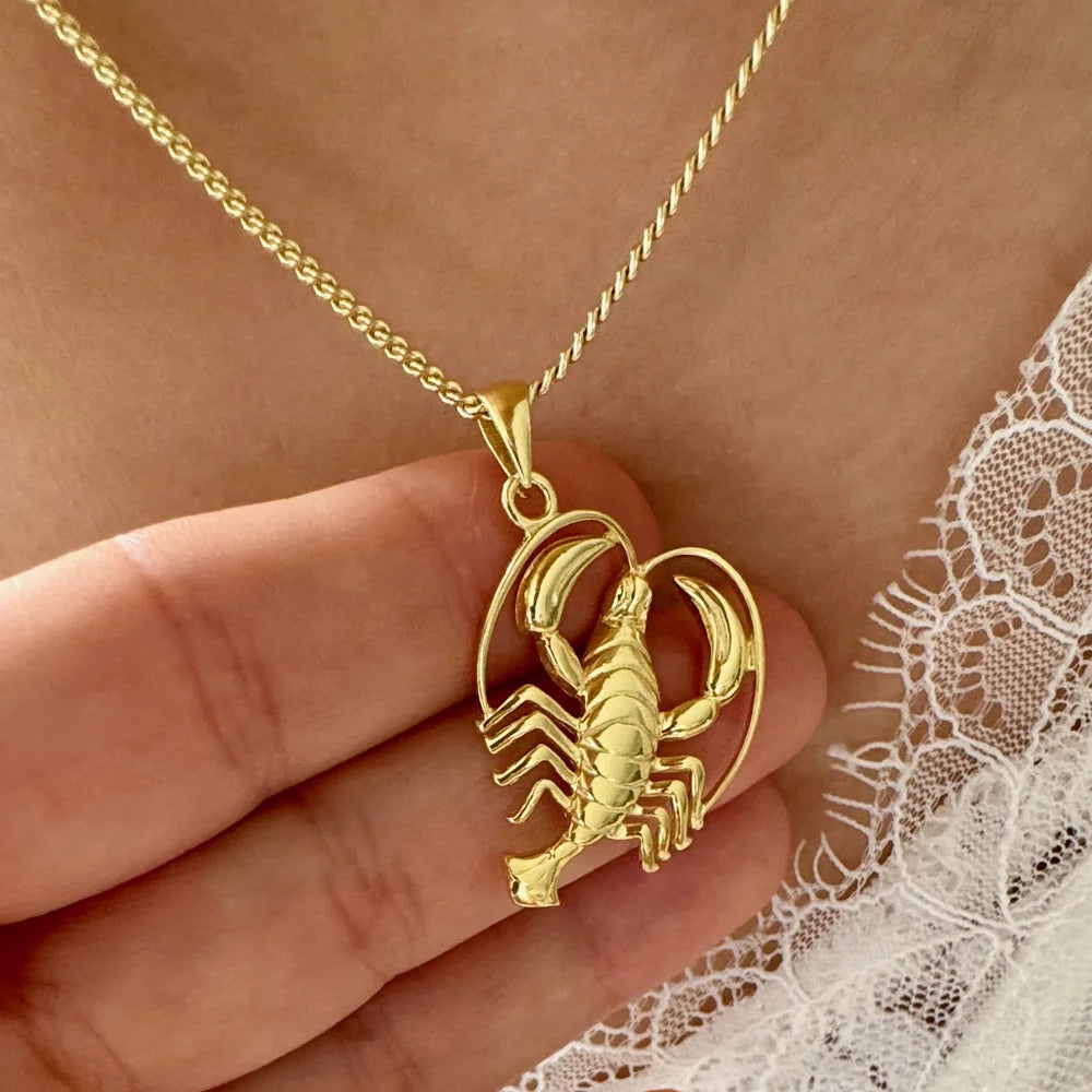 Gold scorpion necklace with a detailed pendant, perfect for women seeking a unique, zodiac-inspired accessory.