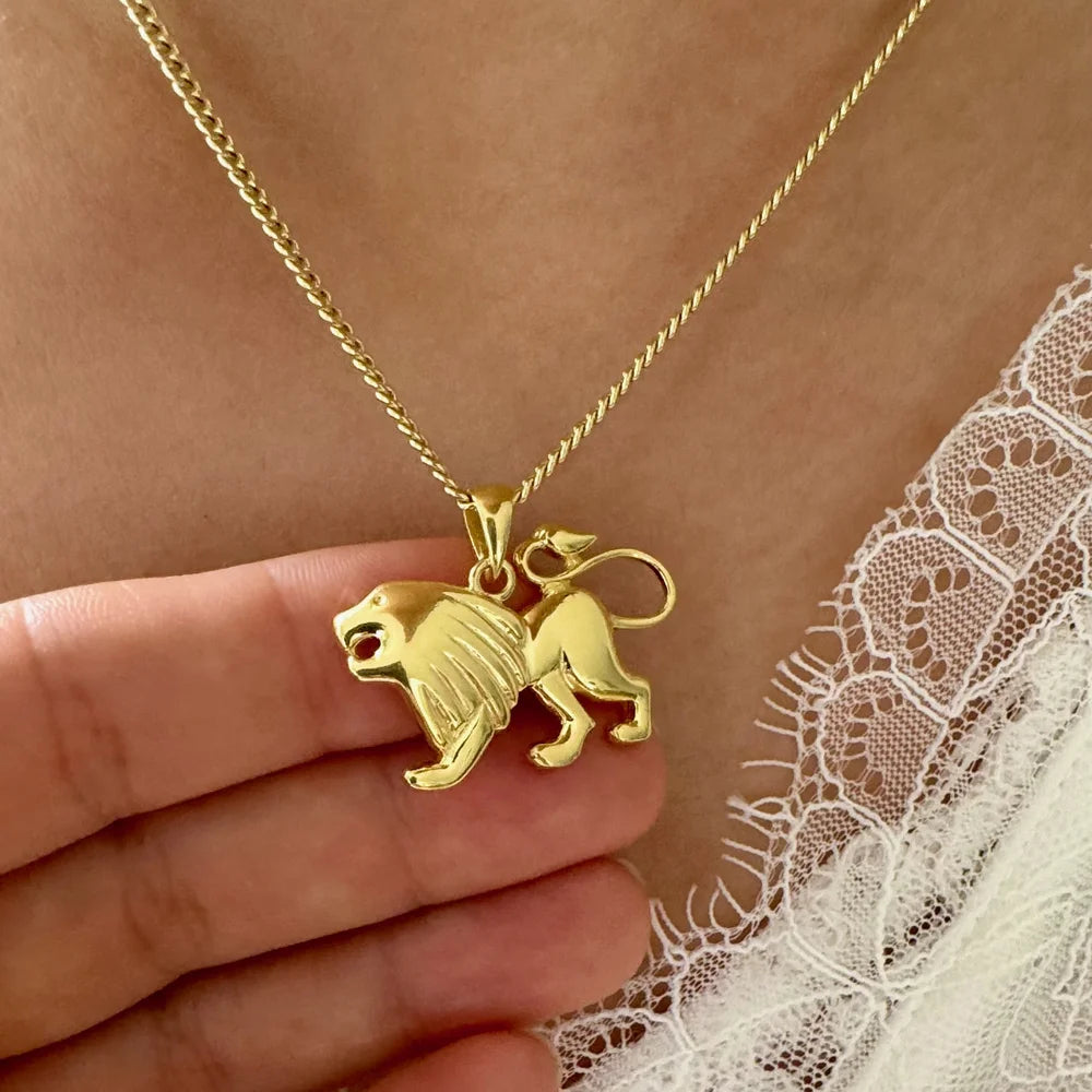 Golden lion pendant necklace, perfect for women. Crafted in gold, ideal for unique, bold, and whimsical styles.