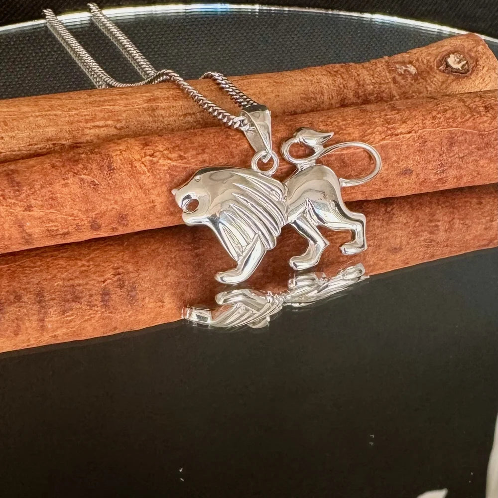 Sterling silver lion pendant necklace, perfect for men and women, adds a bold, stylish touch to any outfit.