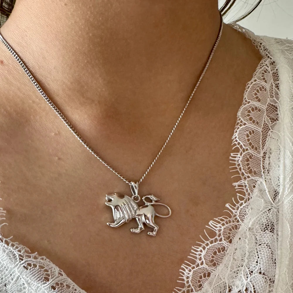 Sterling silver lion pendant necklace, perfect for women seeking a bold, trendy bohemian look. Ideal for any occasion.
