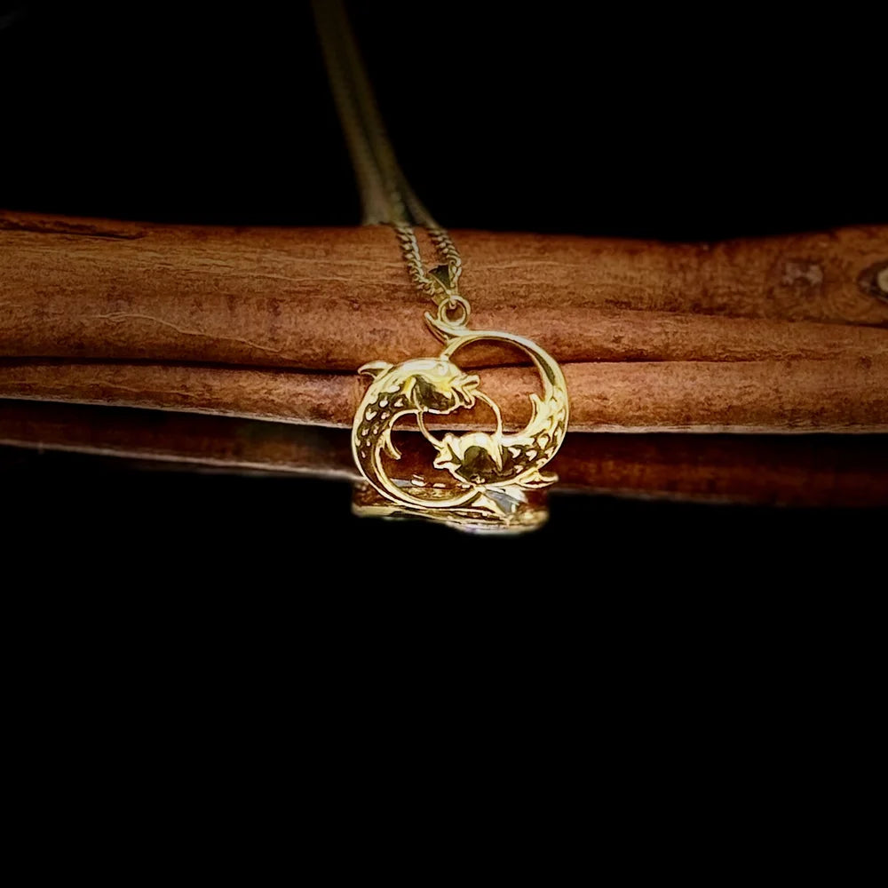 Gold dolphin pendant necklace perfect for women, showcasing a sleek minimalist design ideal for everyday wear.
