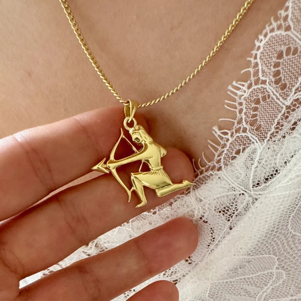 Gold Sagittarius necklace with archer pendant, perfect for women who love unique, bohemian style jewelry.