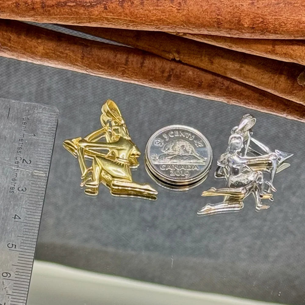 Gold and silver playful archer pendants, ideal for unisex wear, perfect for casual or bohemian styles.