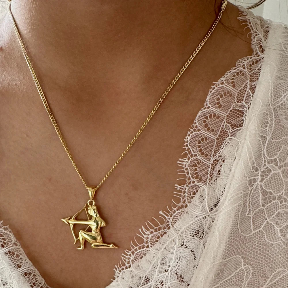 Gold Sagittarius pendant necklace, perfect for women who appreciate celestial and zodiac-themed jewelry.