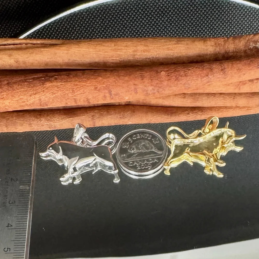 Silver and gold animal charms, perfect for charm bracelets, appealing to animal lovers and minimalist jewelry enthusiasts.
