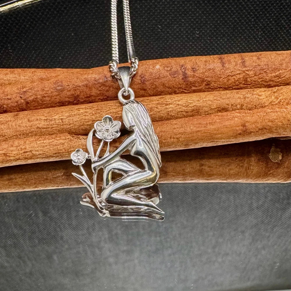 Silver sitting woman pendant necklace, perfect for women who love bohemian and nature-inspired jewelry. Ideal gift choice.