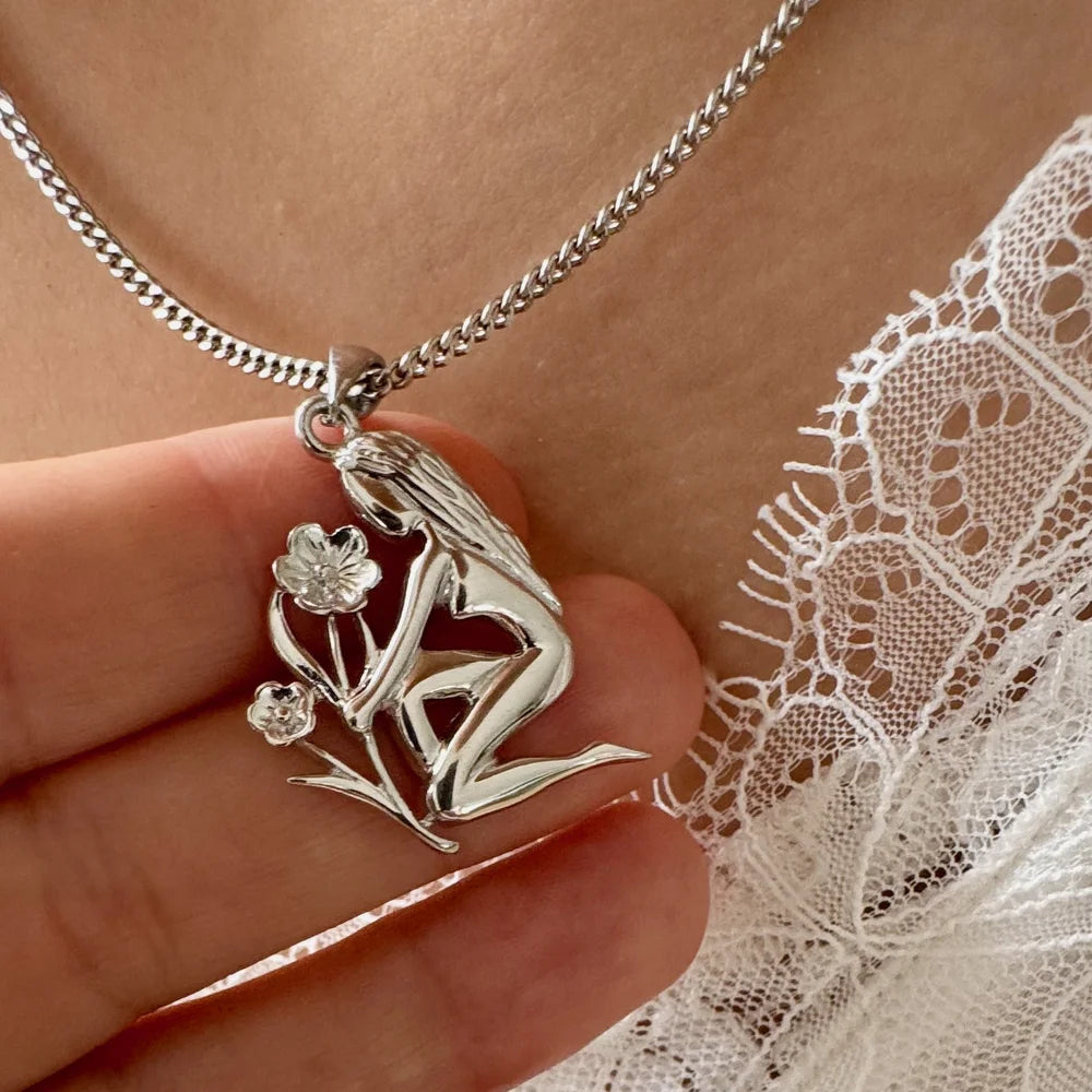 Sterling silver fairy pendant necklace, perfect for women seeking a whimsical, bohemian accessory for everyday wear.