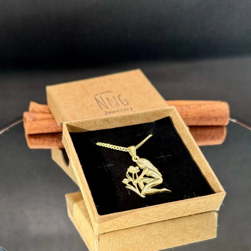 Gold minimalist flower pendant necklace in gift box, perfect for women on special occasions or everyday wear.