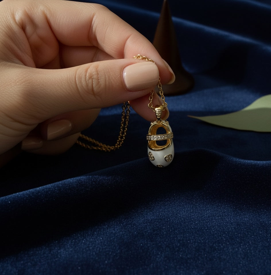 Chic Charm: Golden Glimmer Baby Shoe Pendant - Silver