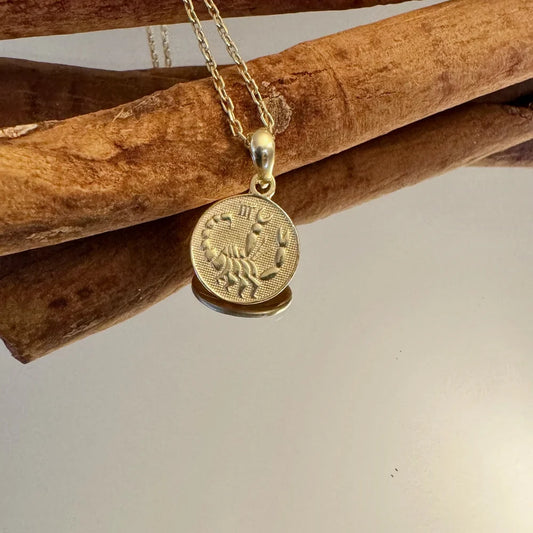 Gold Scorpio zodiac pendant necklace, perfect for women who appreciate minimalist and personalized jewelry styles.