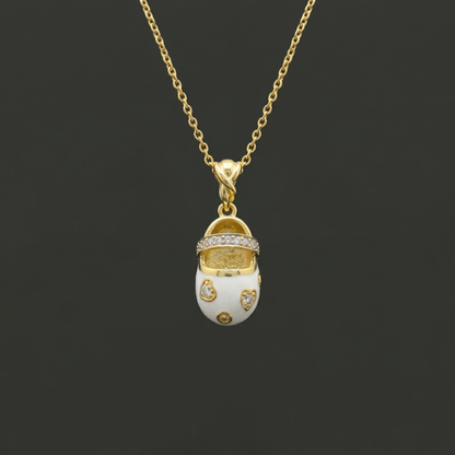 Chic Charm: Golden Glimmer Baby Shoe Pendant - Silver