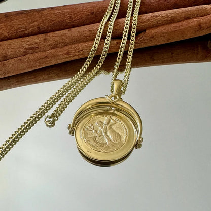 Gold vintage locket necklace with intricate design, perfect for women who love classic jewelry styles.