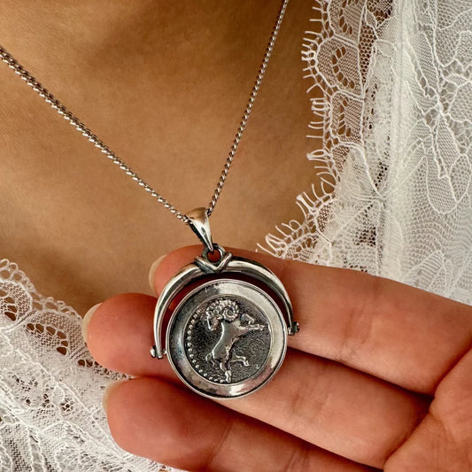 Sterling silver zodiac pendant necklace featuring a detailed Aries design, perfect for women who embrace a classic style.