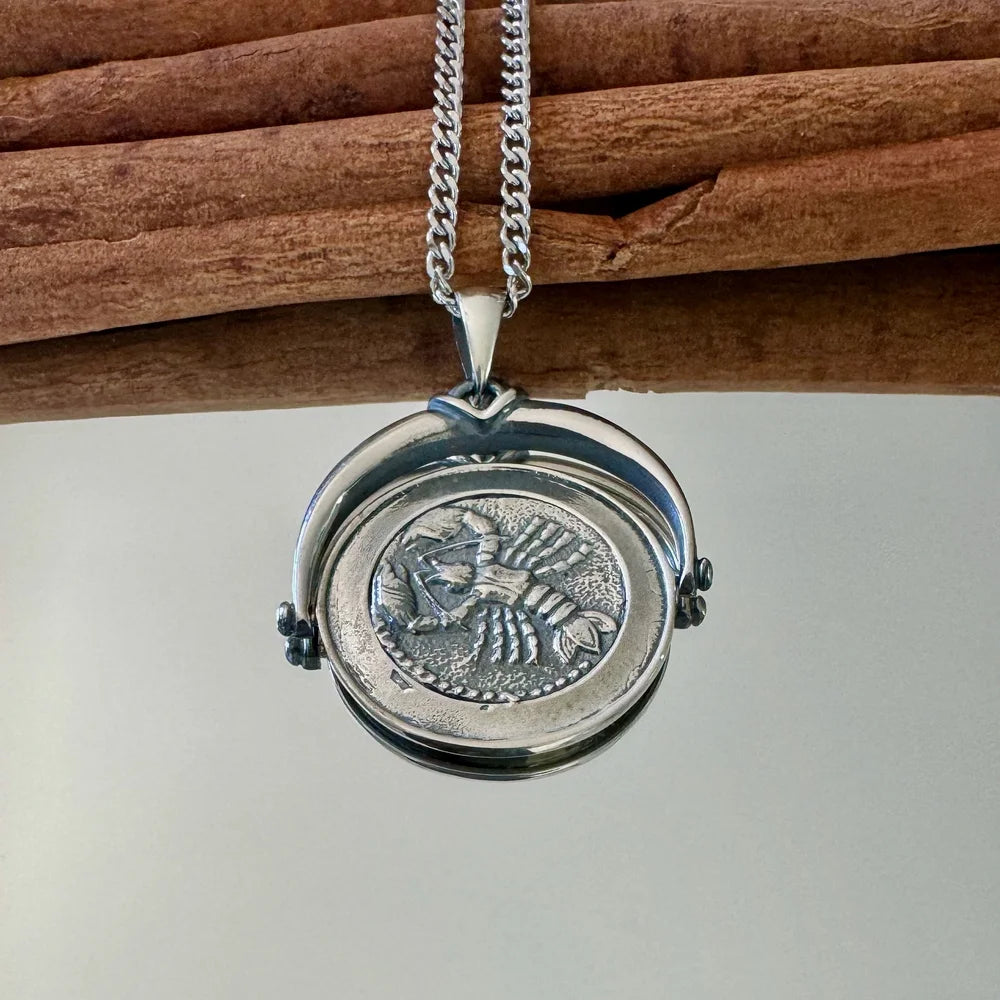 Stylish silver lobster clasp pendant necklace, perfect for women who love unique, nautical-themed jewelry.