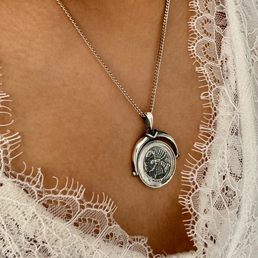Silver vintage coin pendant necklace, perfect for women seeking unique bohemian style for casual or formal occasions.