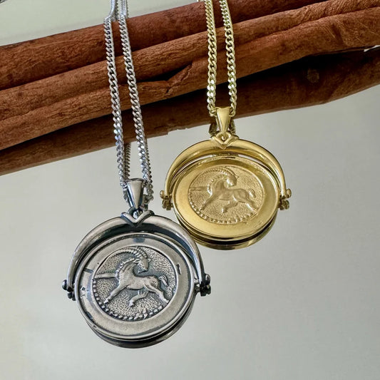 Silver and gold unicorn locket necklaces, perfect for women; a vintage-inspired accessory for special occasions.